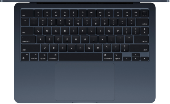 Topdown view of an open macbook computer's keyboard